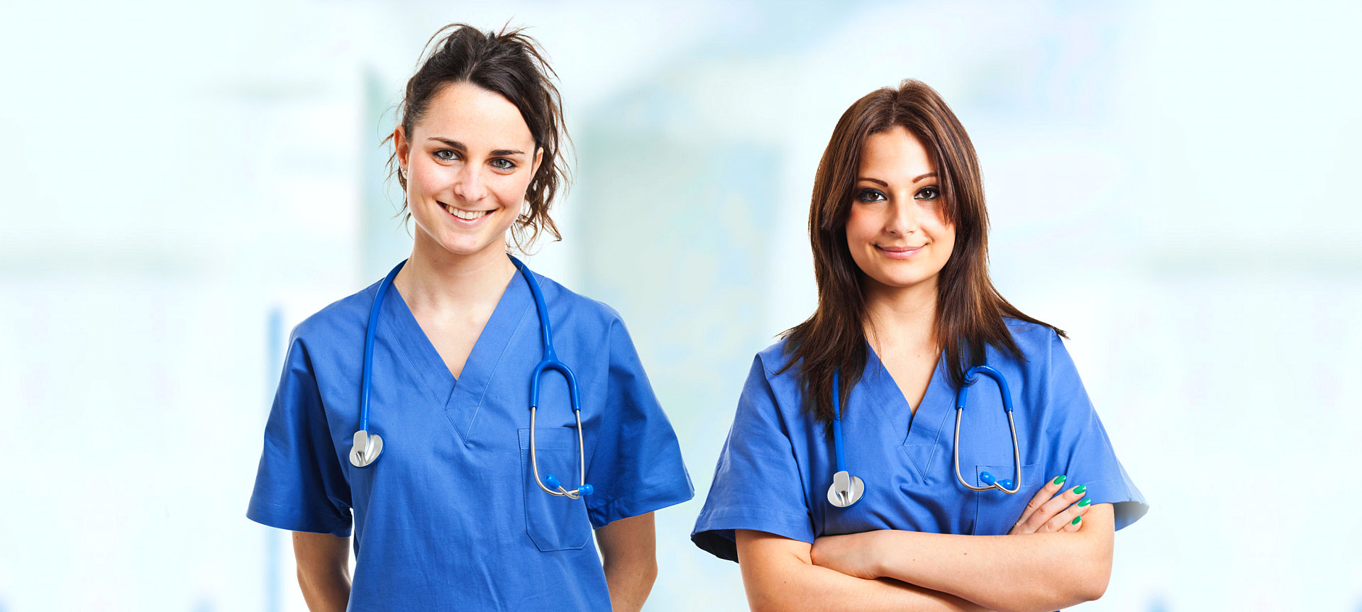two female nurses smiling